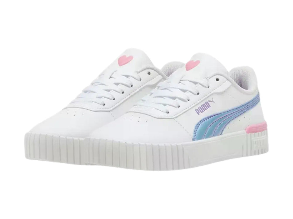 Tenis PUMA blancos con franja azul y detalle rosa en el talón, con suela de plataforma blanca.