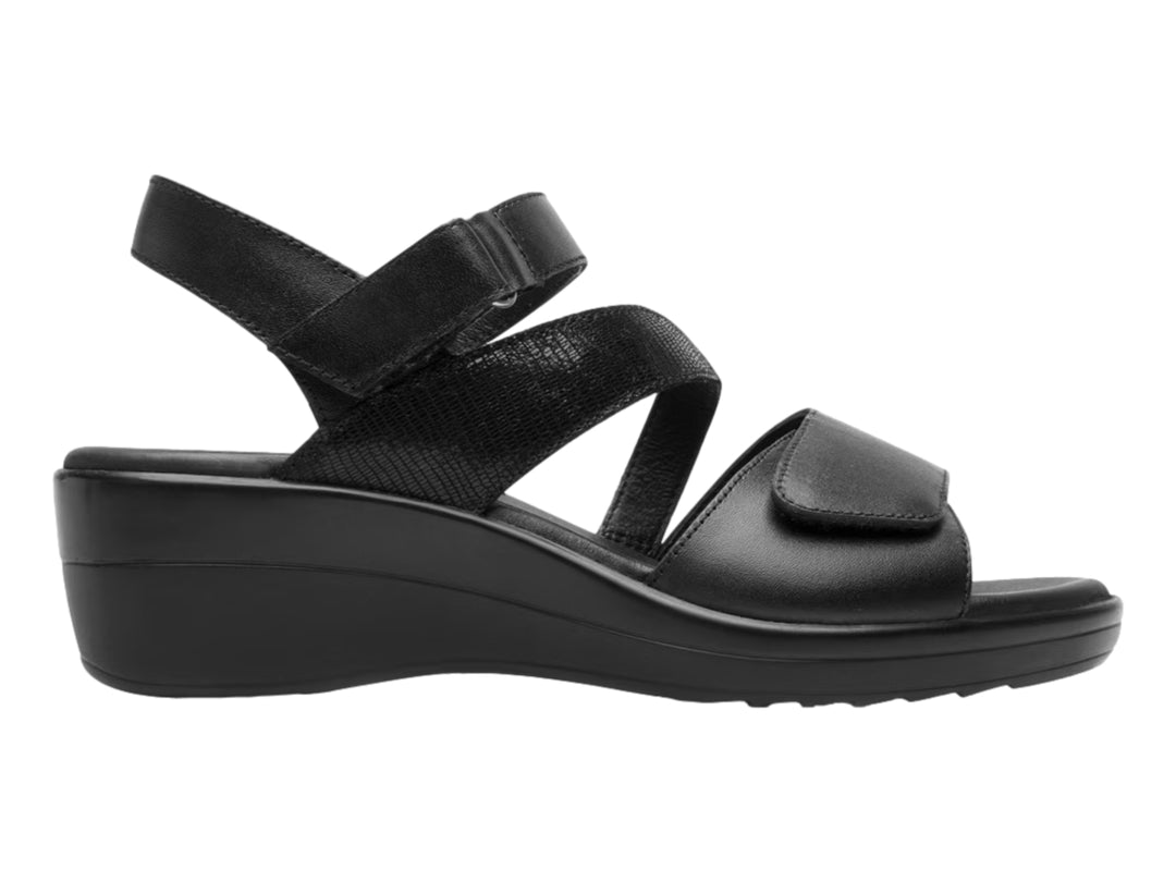 Sandalia negra de plataforma con correas ajustables y suela cómoda.