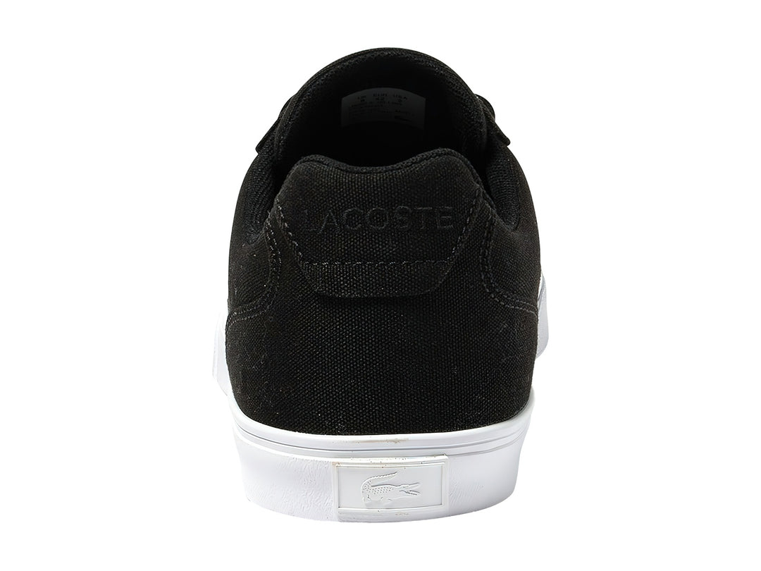 Tenis Lacoste Lerond Pro en color negro con suela blanca y logotipo del cocodrilo en el lateral.