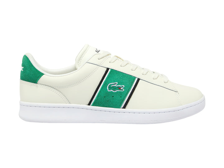 Tenis Lacoste blancos con franja lateral verde y negra y detalle verde en el talón.