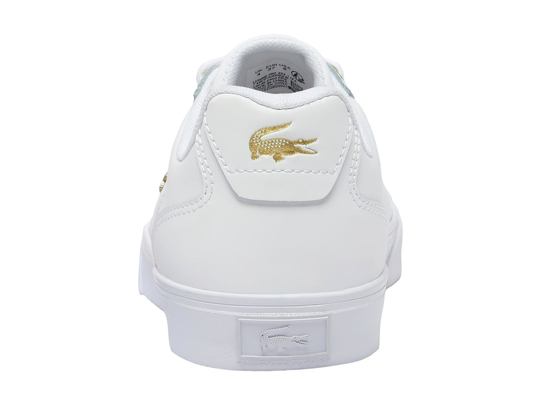 Tenis Lacoste Lerond Pro en color blanco con logotipo y detalles en dorado, fabricados en cuero.