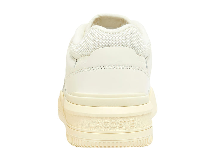 Tenis Lacoste color blanco roto con suela amarillo claro, diseño deportivo y casual.