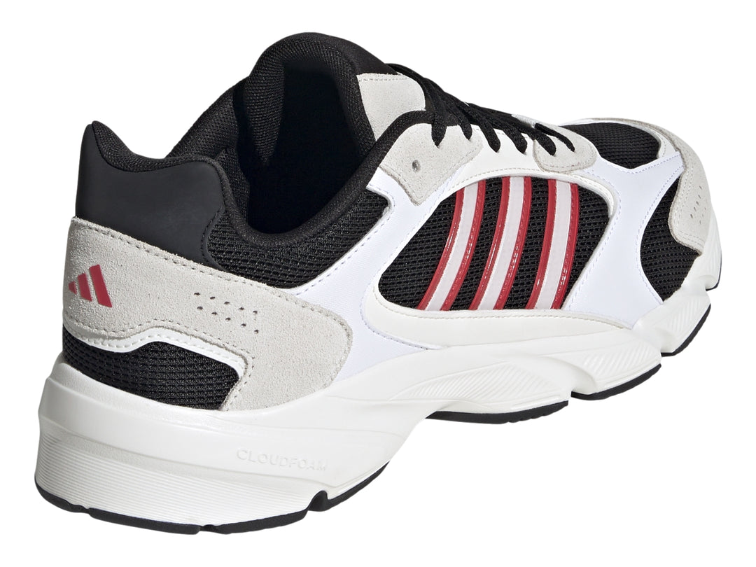 Tenis Adidas Crazy Chaos 2000 en color blanco con detalles en negro y franjas laterales rojas.