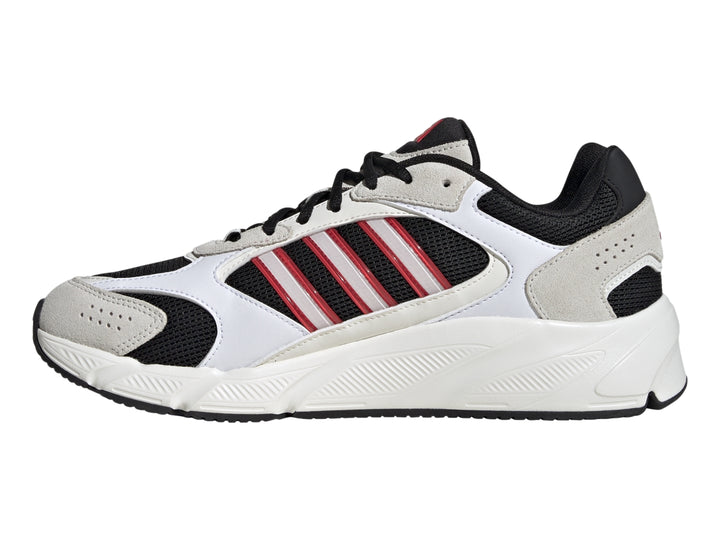 Tenis Adidas Crazy Chaos 2000 en color blanco con detalles en negro y franjas laterales rojas.