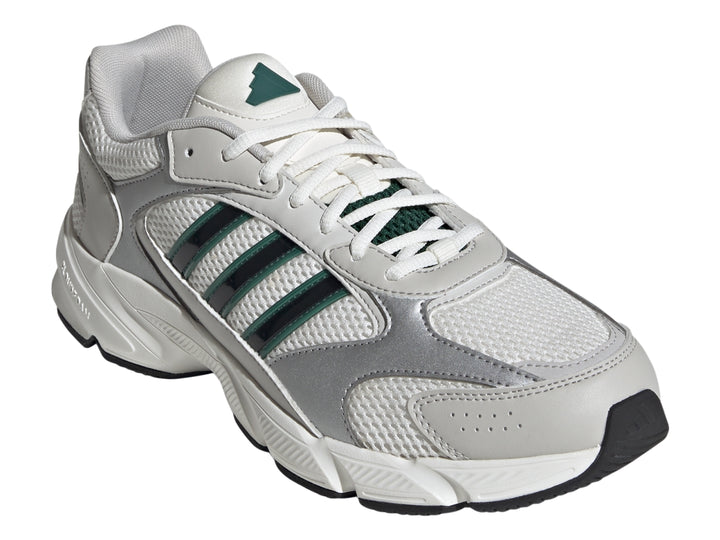 Tenis Adidas Crazychaos 2000 color blanco y plateado con tres franjas verdes y suela blanca.