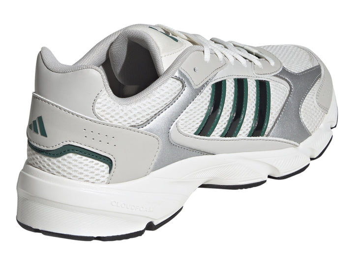 Tenis Adidas Crazychaos 2000 color blanco y plateado con tres franjas verdes y suela blanca.