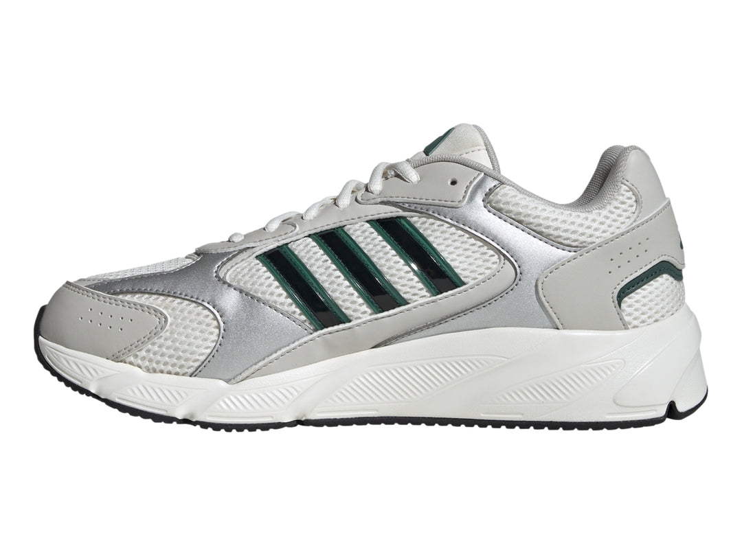 Tenis Adidas Crazychaos 2000 color blanco y plateado con tres franjas verdes y suela blanca.