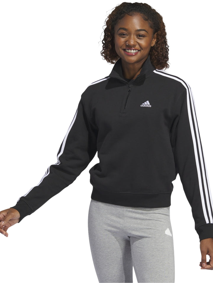 Sudadera deportiva Adidas negra con rayas blancas laterales y cierre parcial en el cuello.