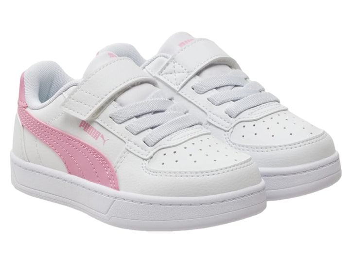 Tenis PUMA blancos con detalles en rosa, cierre de velcro y agujetas para Niño.