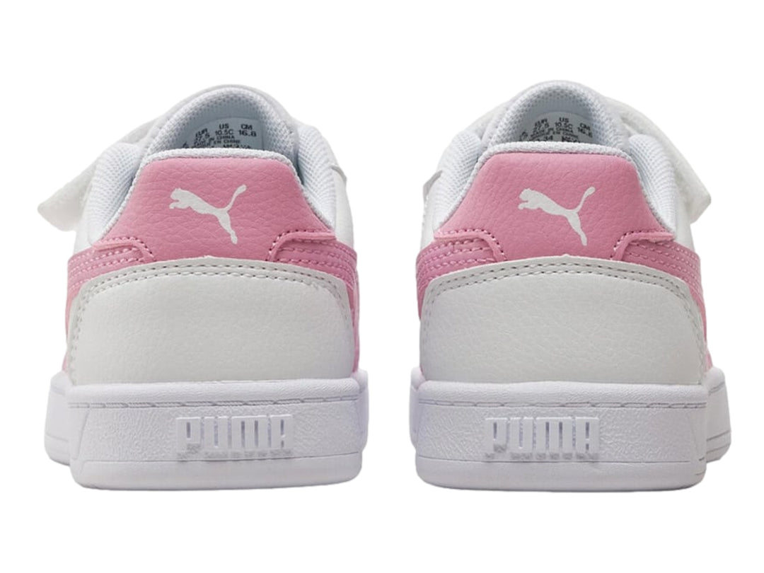 Tenis PUMA blancos con detalles en rosa, cierre de velcro y agujetas para Niño.