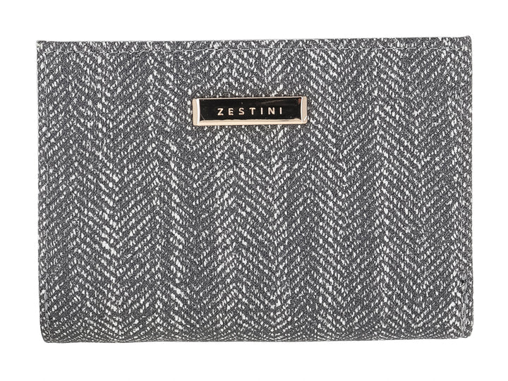 Monedero rectangular de tela con estampado de espiga en colores negro y gris y placa metálica central.