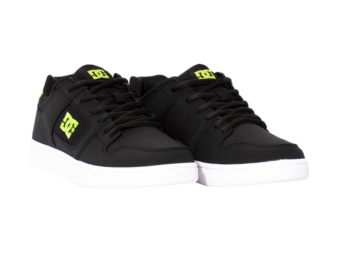 Tenis DC Shoes modelo Adys en color negro con detalles en lima y suela blanca.