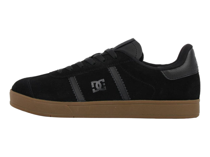 Tenis DC Shoes Ollie SD MX color negro con detalles en gris y suela color café.