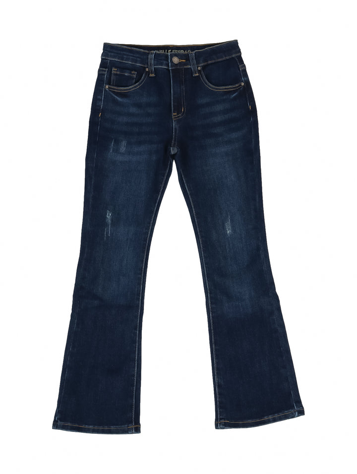 Jeans azul oscuro para niña con corte acampanado y efecto de lavado doble stone.