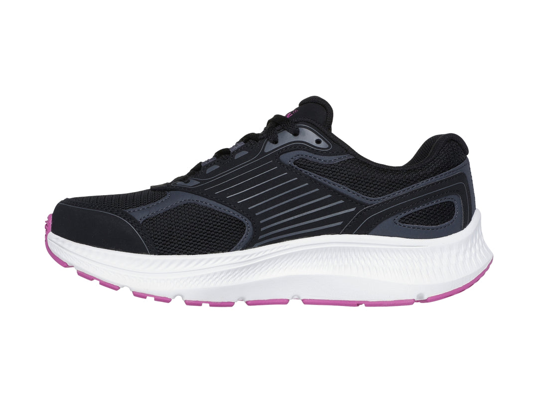 Tenis deportivos Skechers Go Run Consistent 2.0 en color negro con suela blanca y detalles en fucsia.