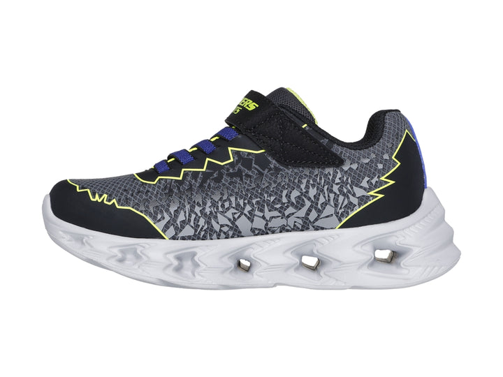 Tenis deportivos Skechers para niño en color negro y amarillo con suela blanca iluminada por luces LED.