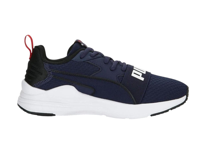 Tenis PUMA Wired Run Pure PS en color azul marino con suela blanca y detalles en rojo.