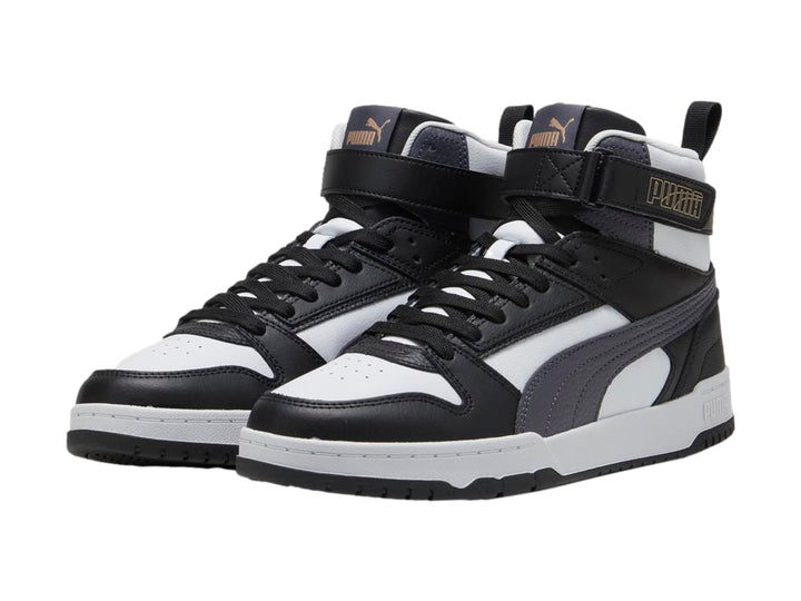 Tenis PUMA RBD Game de bota alta en colores negro, blanco y gris con correa ajustable en el tobillo.
