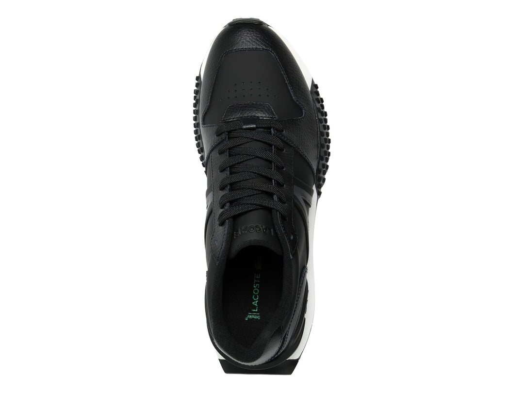 Tenis Lacoste L-Spin Deluxe 2.0 en color negro con suela blanca y detalles en cuero rugoso.