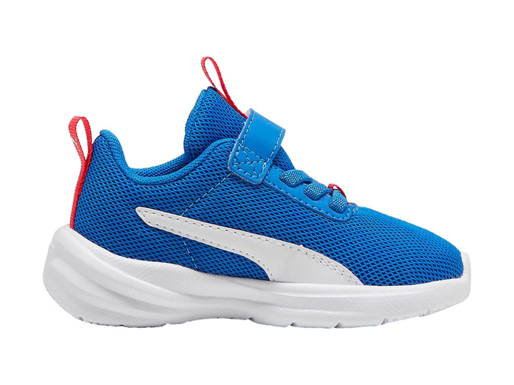 Tenis deportivos PUMA infantiles color azul con suela blanca y tiradores rojos.