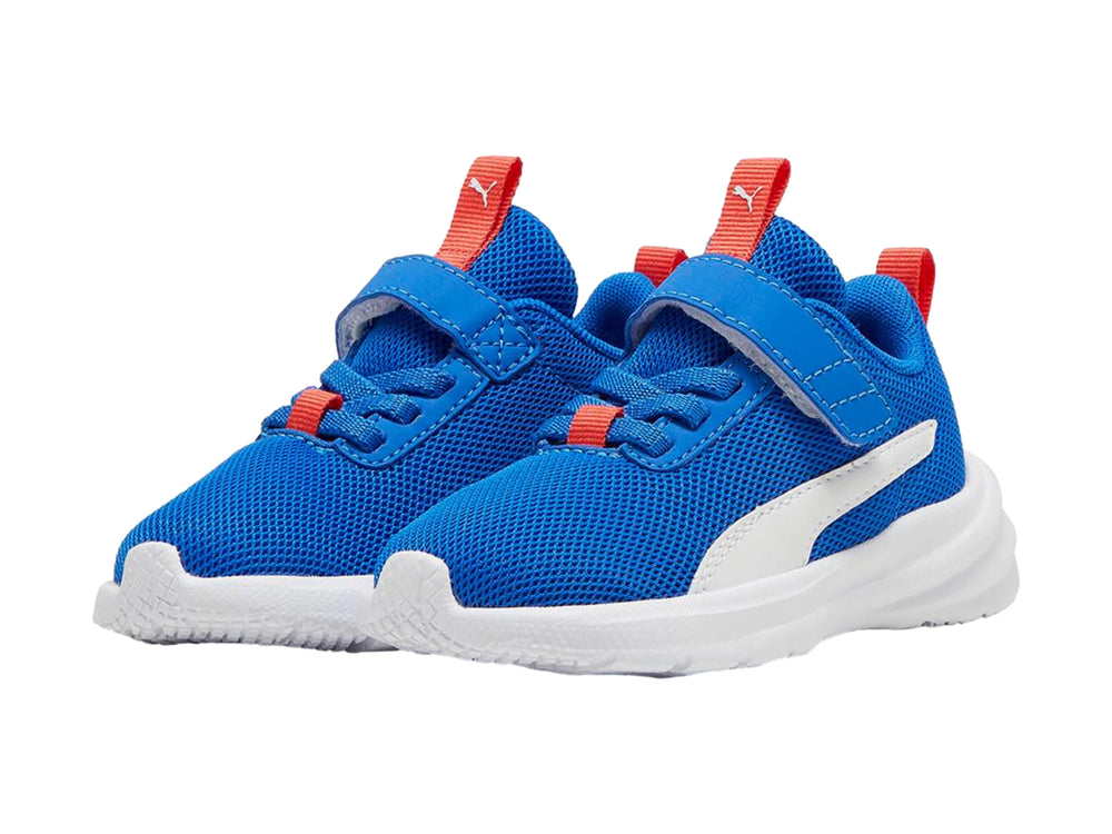 Tenis deportivos PUMA infantiles color azul con suela blanca y tiradores rojos.