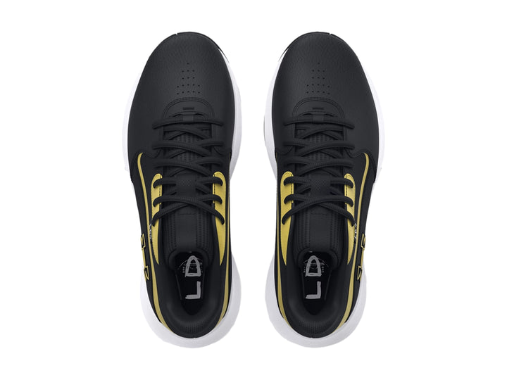 Tenis de baloncesto Under Armour Lockdown 7 en color negro con detalles dorados y suela blanca.