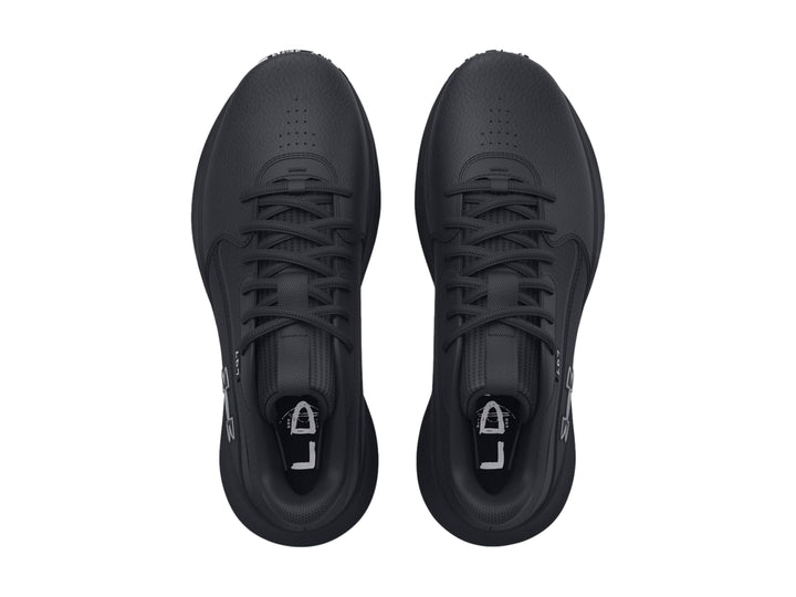 Tenis de baloncesto Under Armour Lockdown 7 color negro con suela estampada en blanco y negro.