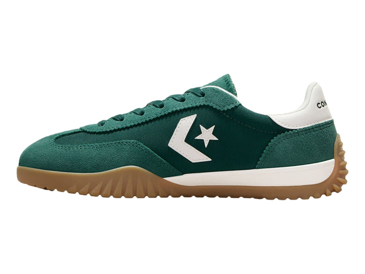 Tenis Converse Run Star Trainer color verde con suela marrón y detalles blancos.