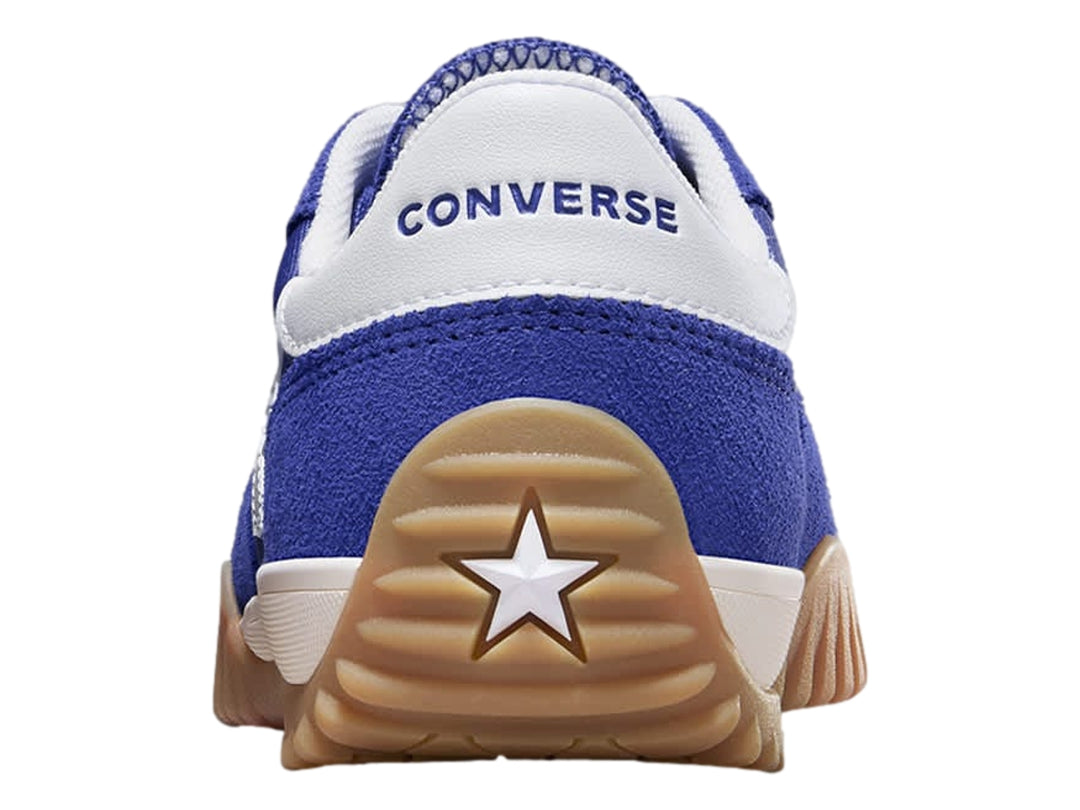 Tenis Converse Run Star Trainer en color azul noche con suela café y detalles en blanco.