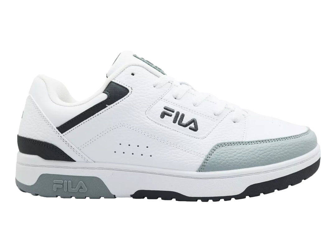 Tenis FILA blancos con detalles en gris y negro, diseño de corte bajo.