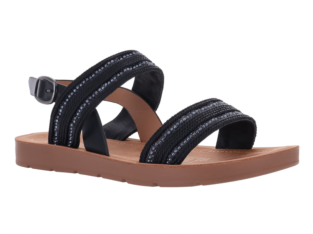 Sandalia plana color negro con detalles brillantes y suela color café.