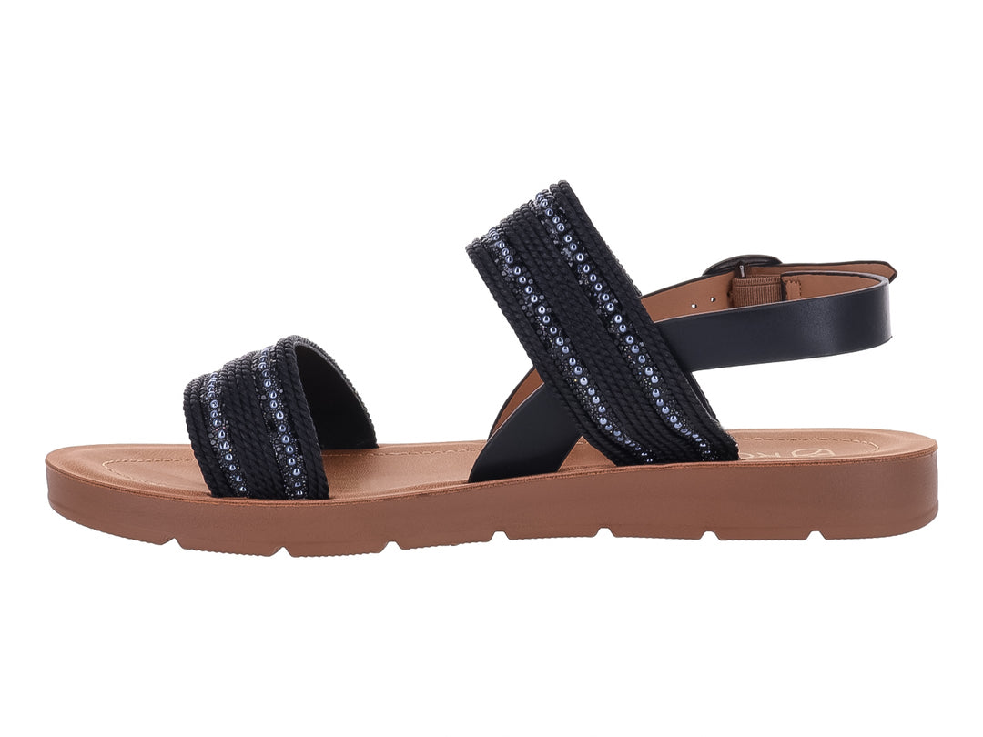 Sandalia plana color negro con detalles brillantes y suela color café.