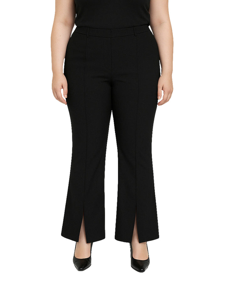 Pantalón de maternidad color negro con aberturas laterales en el ruedo.