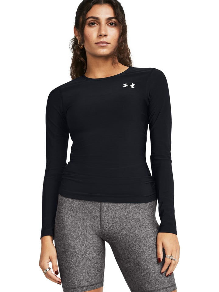 Camiseta deportiva de compresión manga larga color negro para mujer de la marca Under Armour.