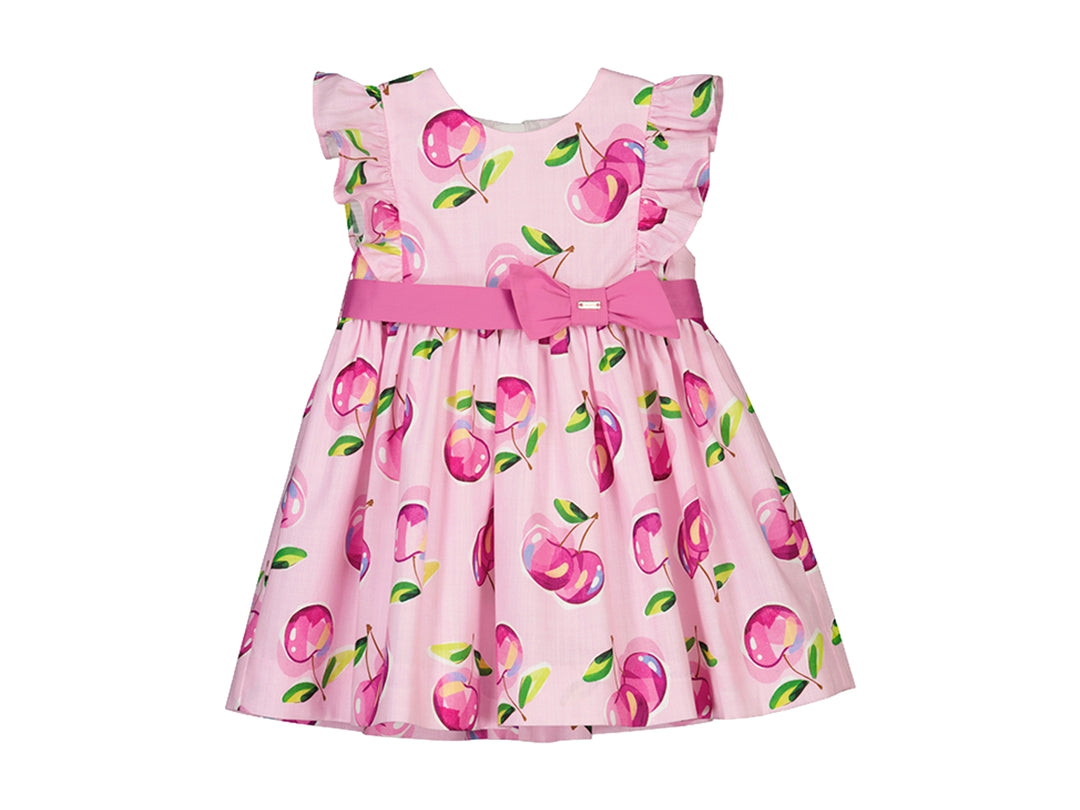 Vestido color malva para niña con estampado floral y moño rosa en la cintura.