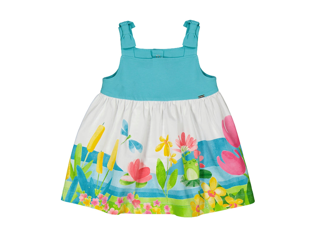 Vestido para niña con parte superior turquesa y falda blanca con estampado floral colorido.