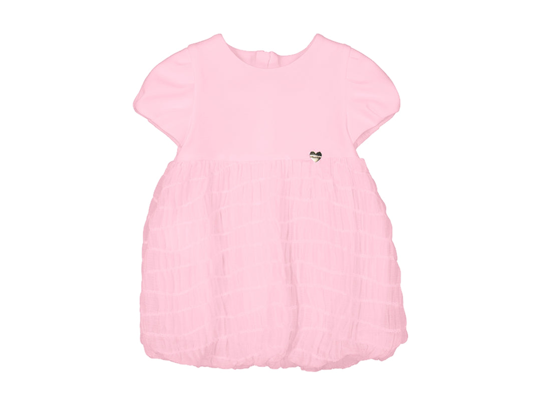 Vestido bombacho color malva para bebé con manga corta y pequeño detalle de corazón.