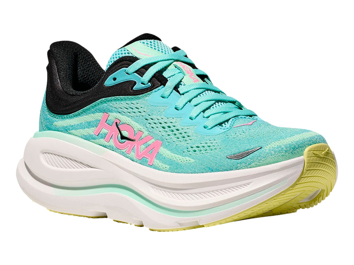 Tenis deportivos HOKA color turquesa con suela blanca ancha y detalles en negro.