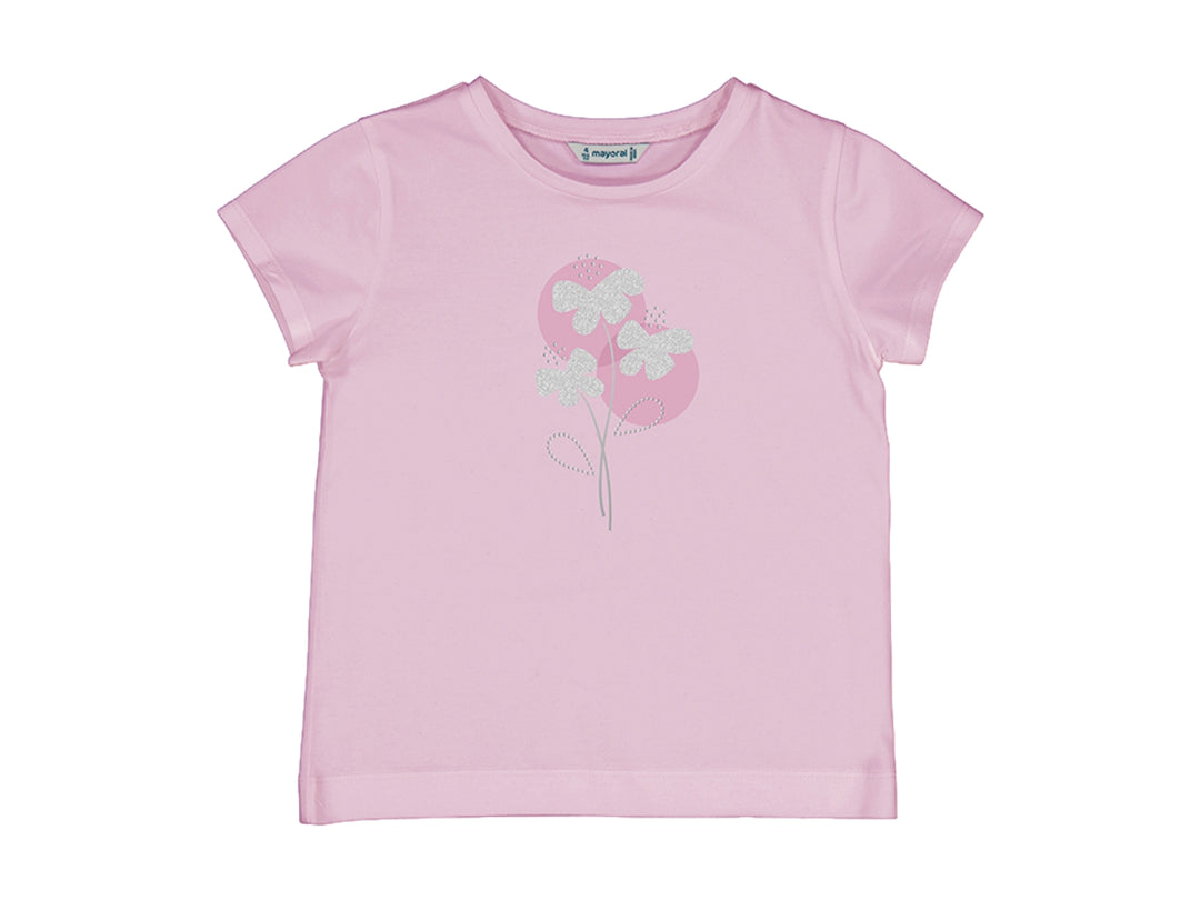 Camiseta básica color malva para niña con estampado floral blanco en el pecho.