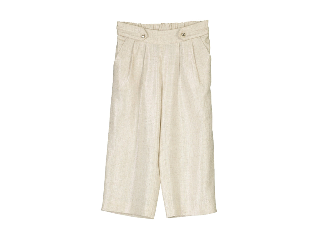 Pantalón largo de lino color beige para niños con cintura elástica y pierna ancha.