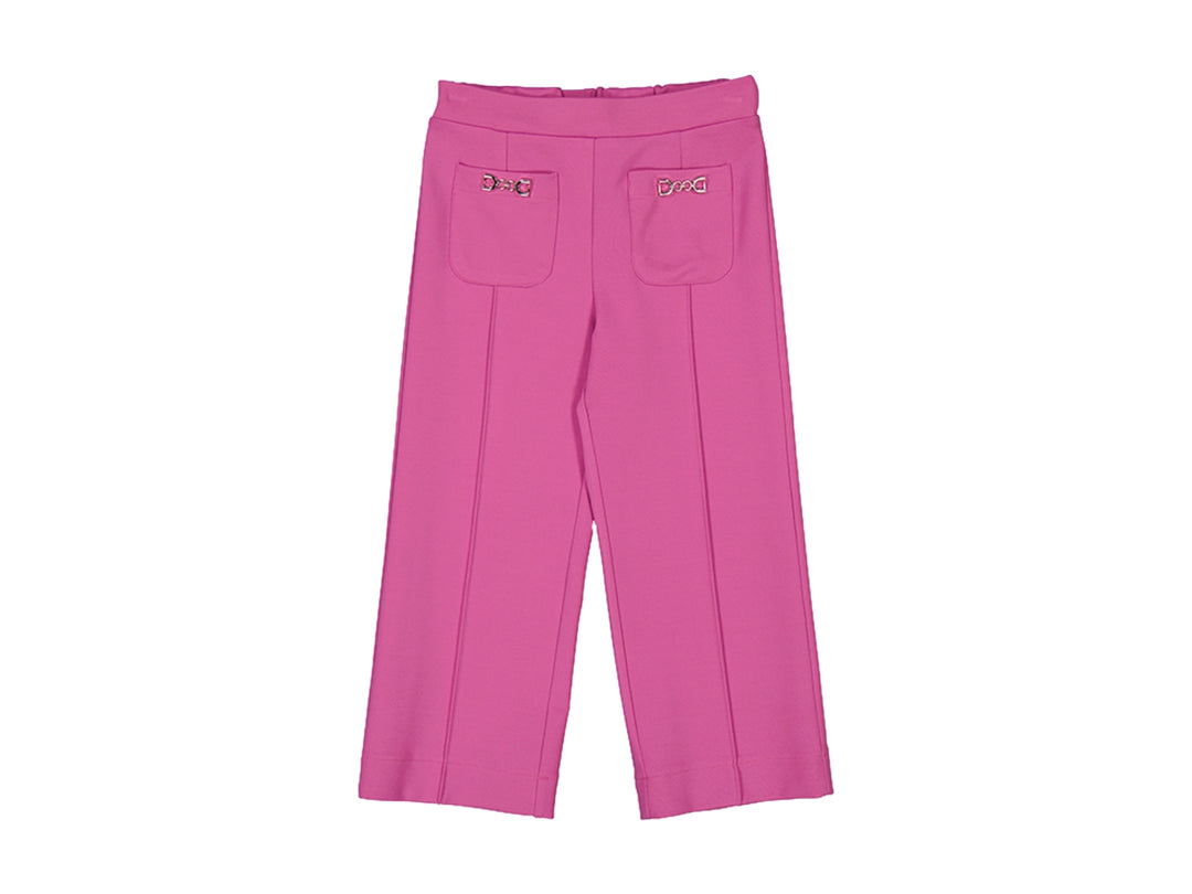 Pantalón largo color rosa orquídea para niña con pierna ancha y detalles en los bolsillos.