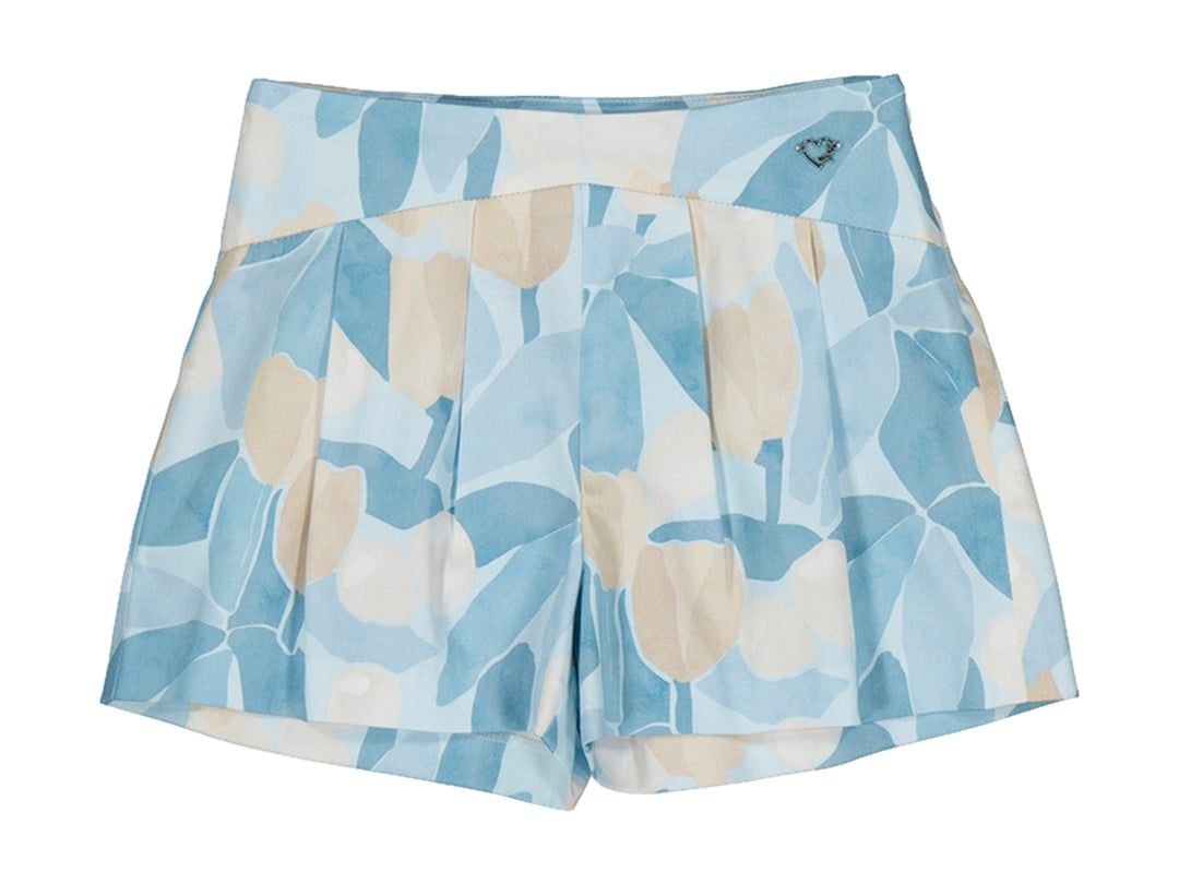 Falda infantil color azul cielo con estampado floral beige.