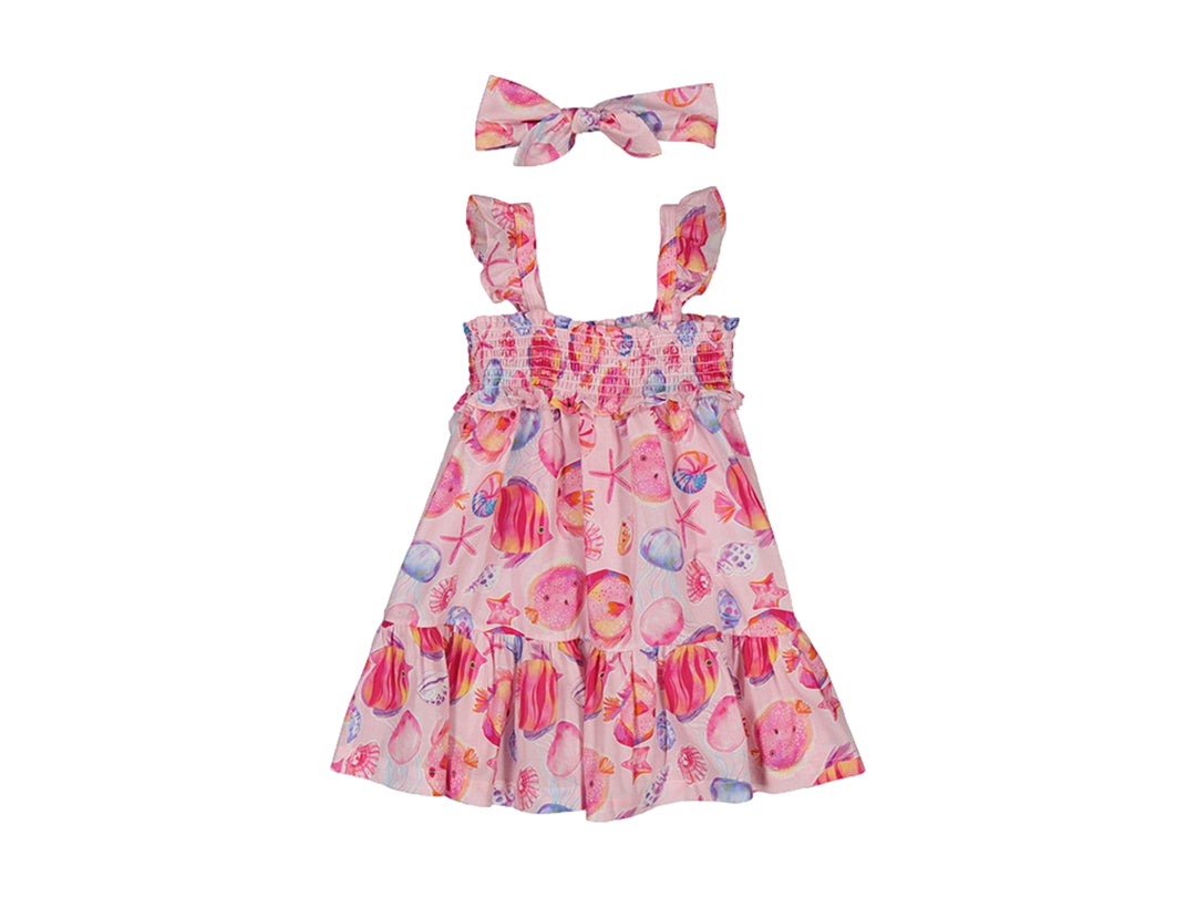 Vestido infantil color magenta con estampado de conchas marinas y diadema a juego.