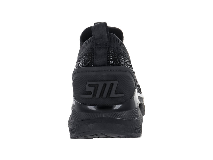 Tenis negros de Steve Madden con detalles de cristales brillantes en el lateral y suela gruesa.