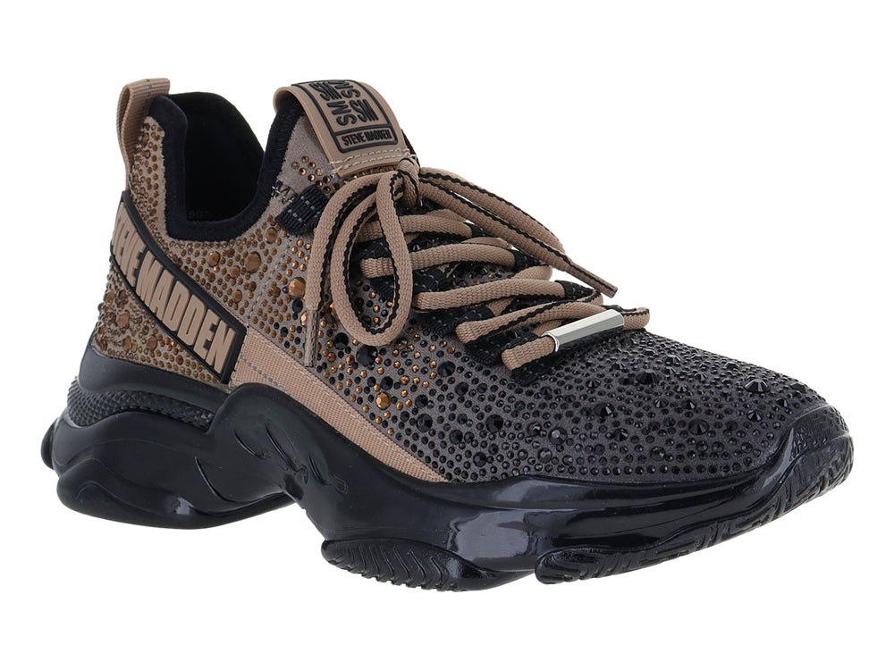 Tenis Steve Madden Mistic en color negro y dorado con suela chunky brillante.