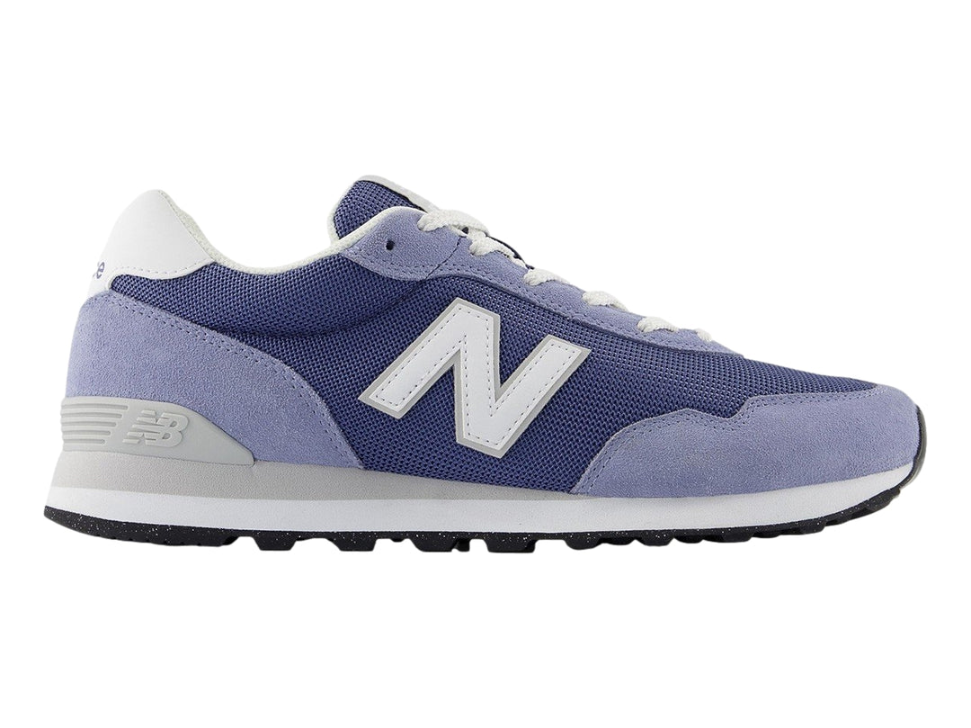 Tenis New Balance ML 515 en colores azul marino y azul claro con suela blanca.