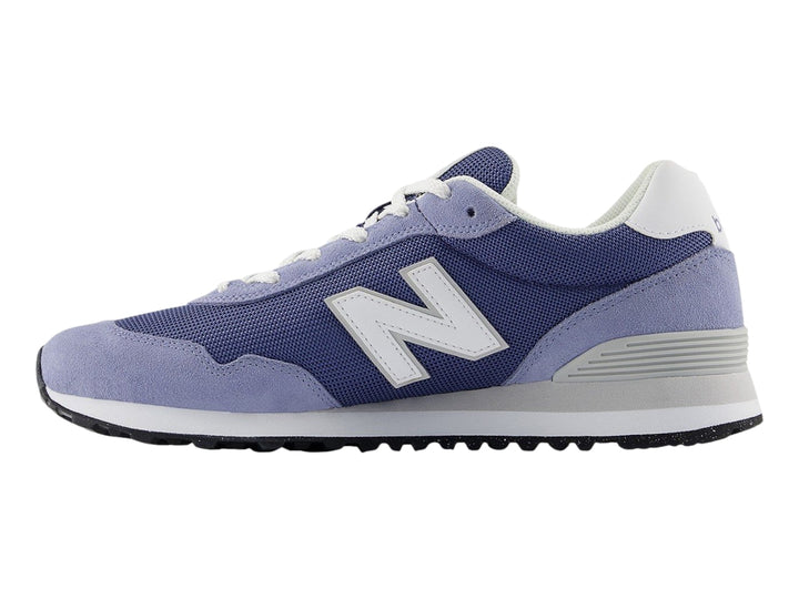 Tenis New Balance ML 515 en colores azul marino y azul claro con suela blanca.