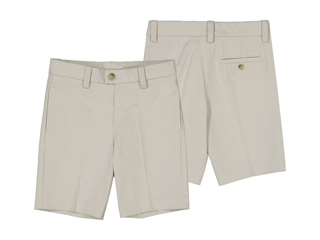 Bermudas color hueso para niño de corte slim suiting.