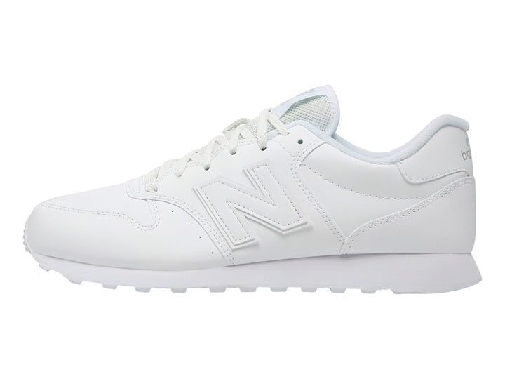 Tenis New Balance modelo 500 en color blanco total con suela blanca y cordones blancos.