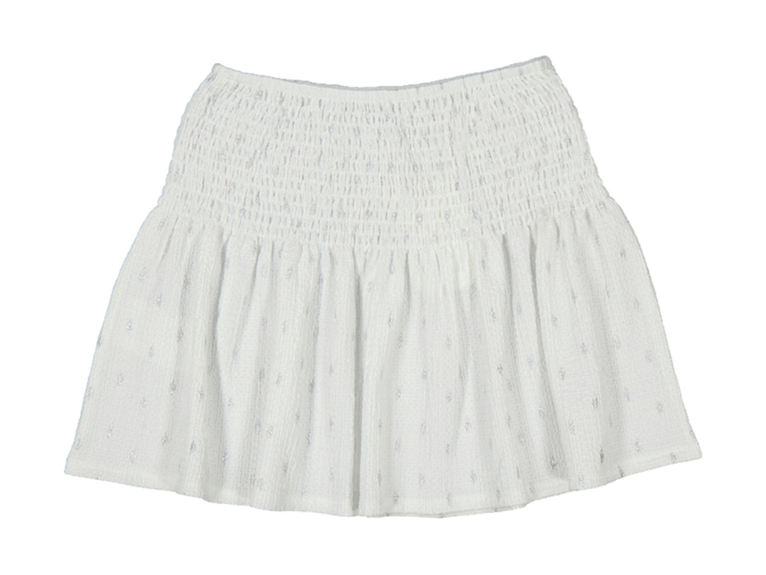 Falda color crudo para niña con cintura elástica tipo smock y tejido de punto.
